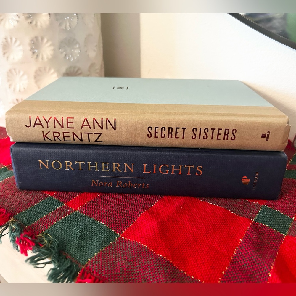 Gold and Blue Decorative Hard Cover Books by Jayne Ann Krentz and Nora Roberts